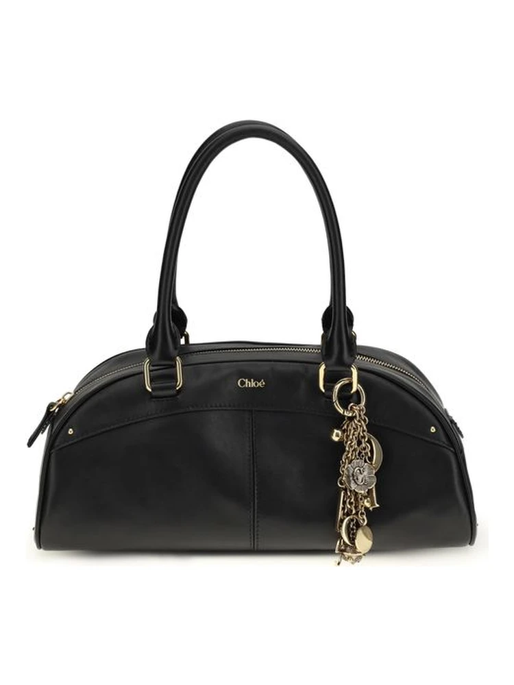 حقيبة كتف بوس توروس من جلد العجل الأسود