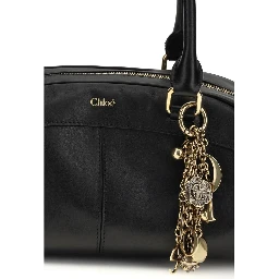 حقيبة كتف بوس توروس من جلد العجل الأسود