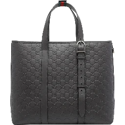 حقيبة تسوق كبيرة رمادية داكنة اللون مزينة بشعار GG