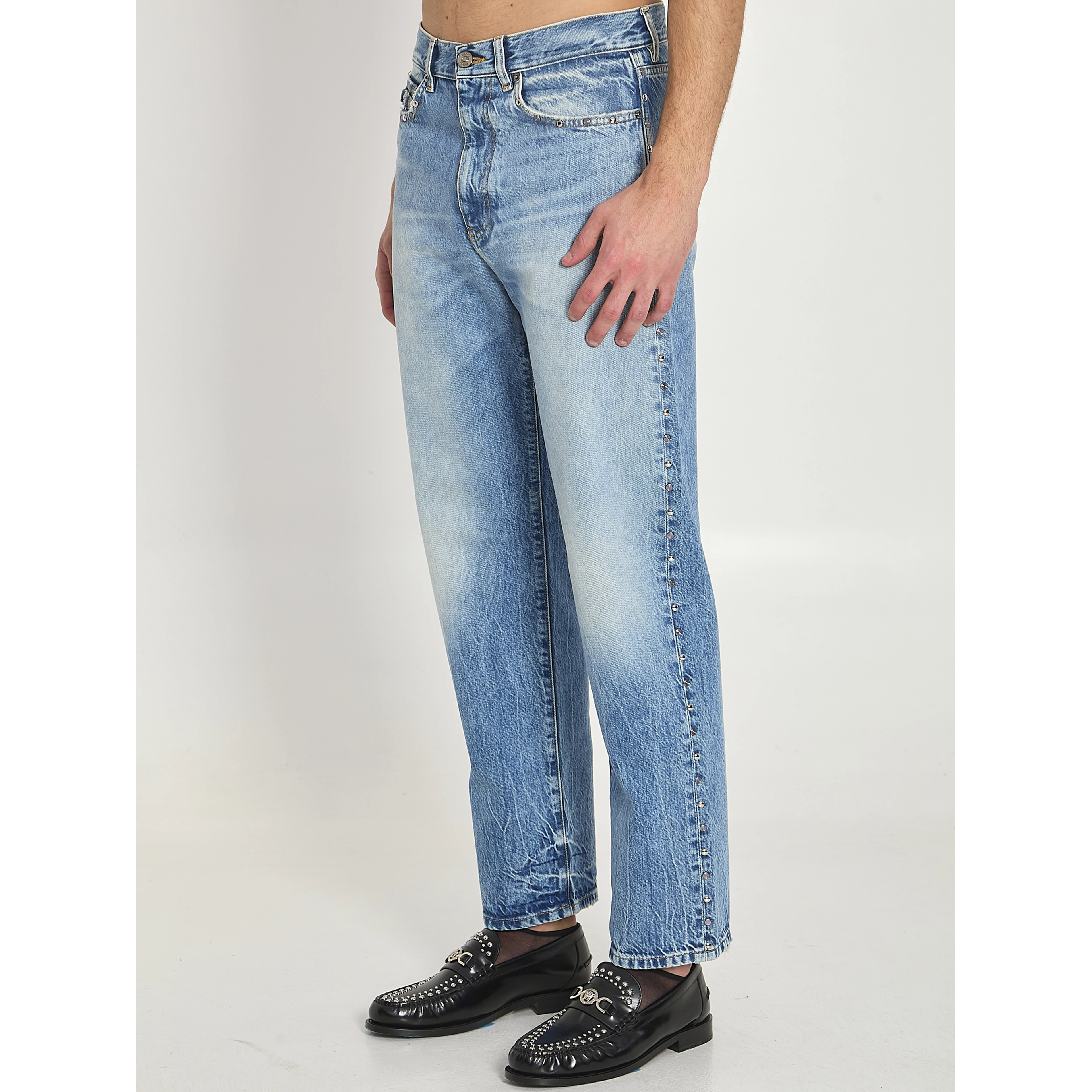 Stone-wash jeans with studs