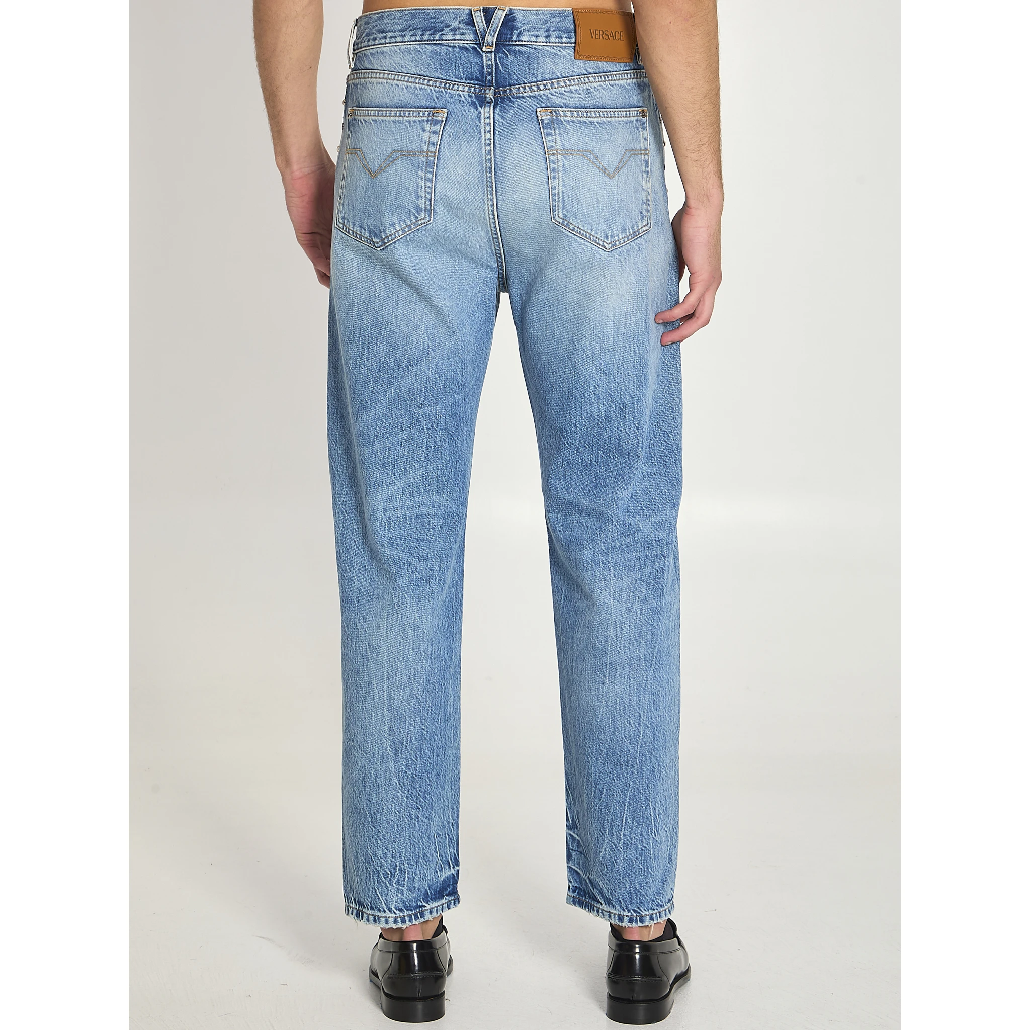 Stone-wash jeans with studs