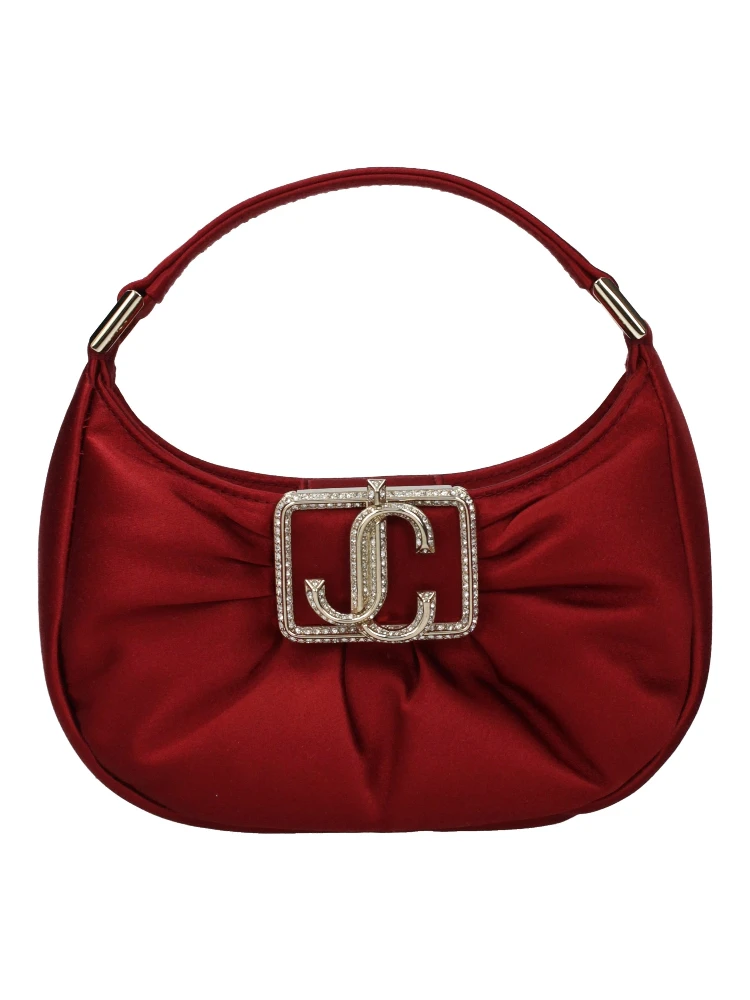 حقيبة يد من الساتان الأحمر