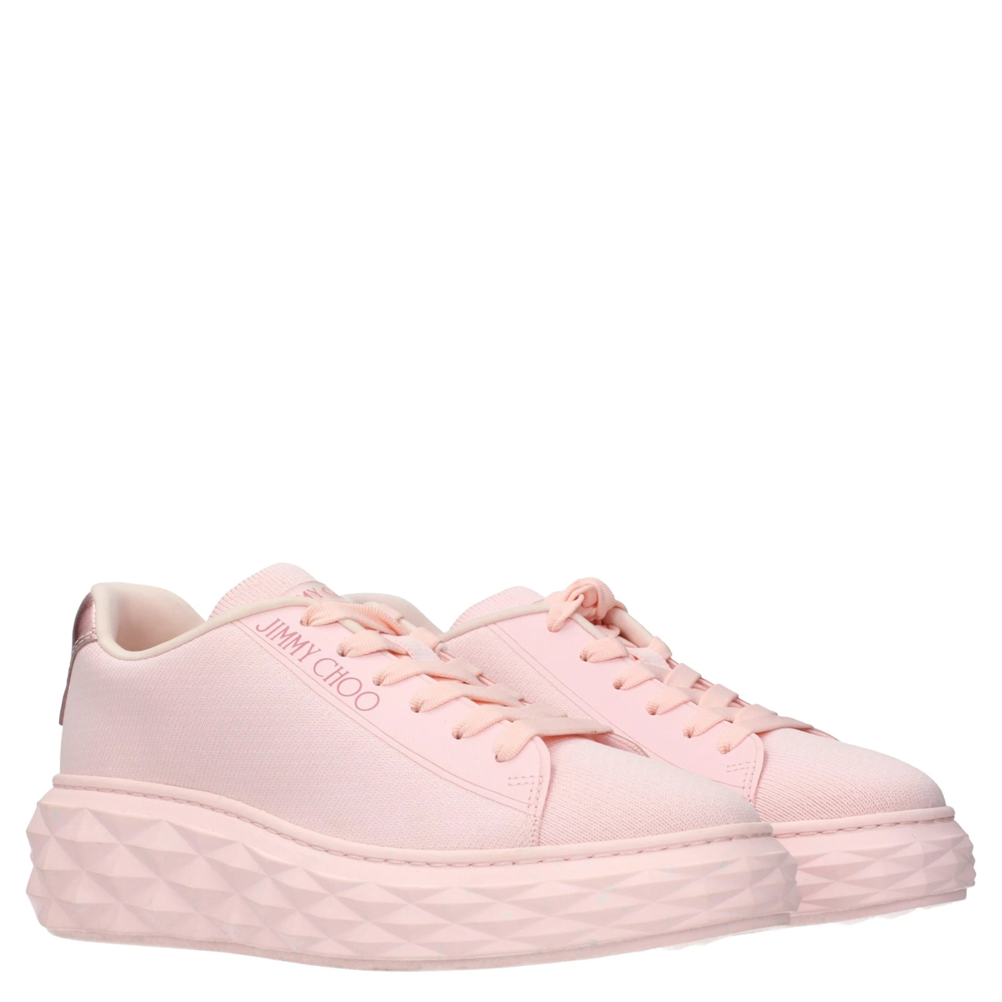 حذاء رياضي وردي اللون ذو نعل سميك