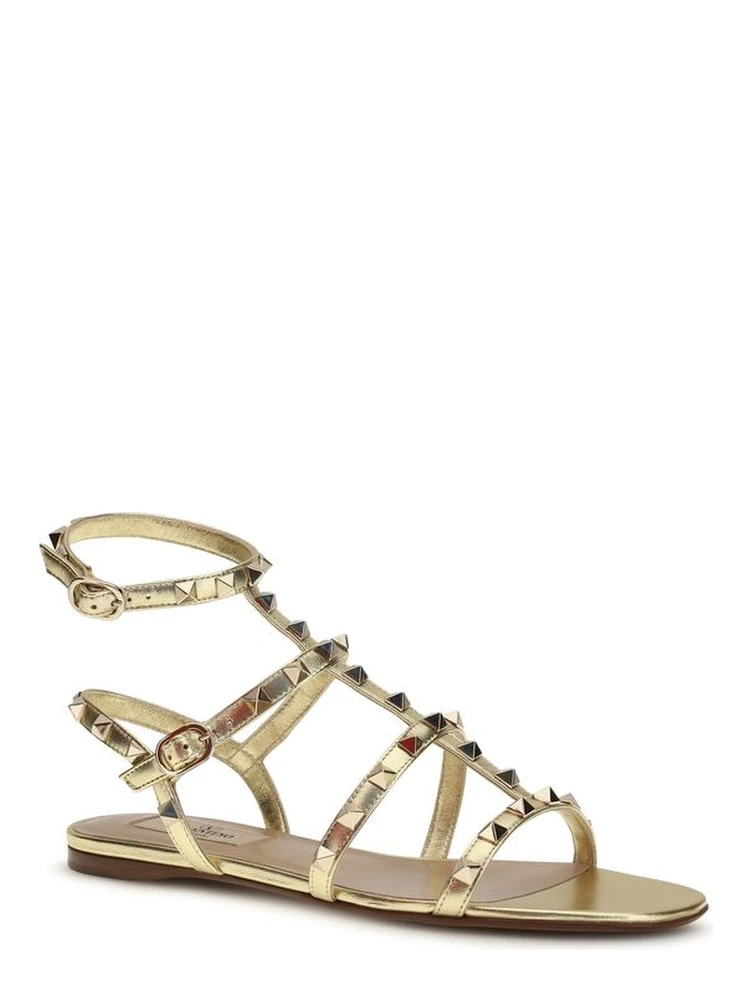 صندل مسطح من جلد العجل الذهبي من بوس توروس alternative