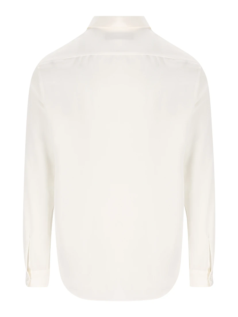 قمصان غوتشي بيضاء