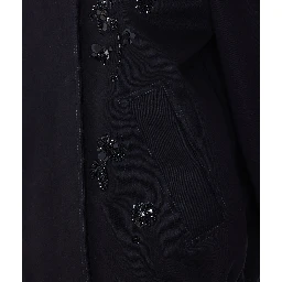 معاطف غولدن غوس سوداء