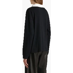 تيشيرتات وبولو سوداء من KHAITE