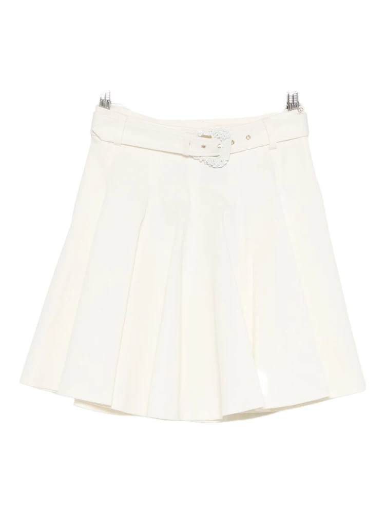 تنانير جينز من فيرساتشي كوتور باللون الكريمي