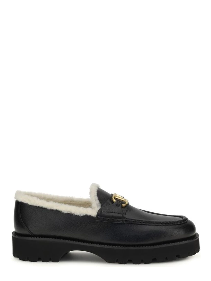 حذاء بوس توروس سهل الارتداء من جلد العجل الأسود