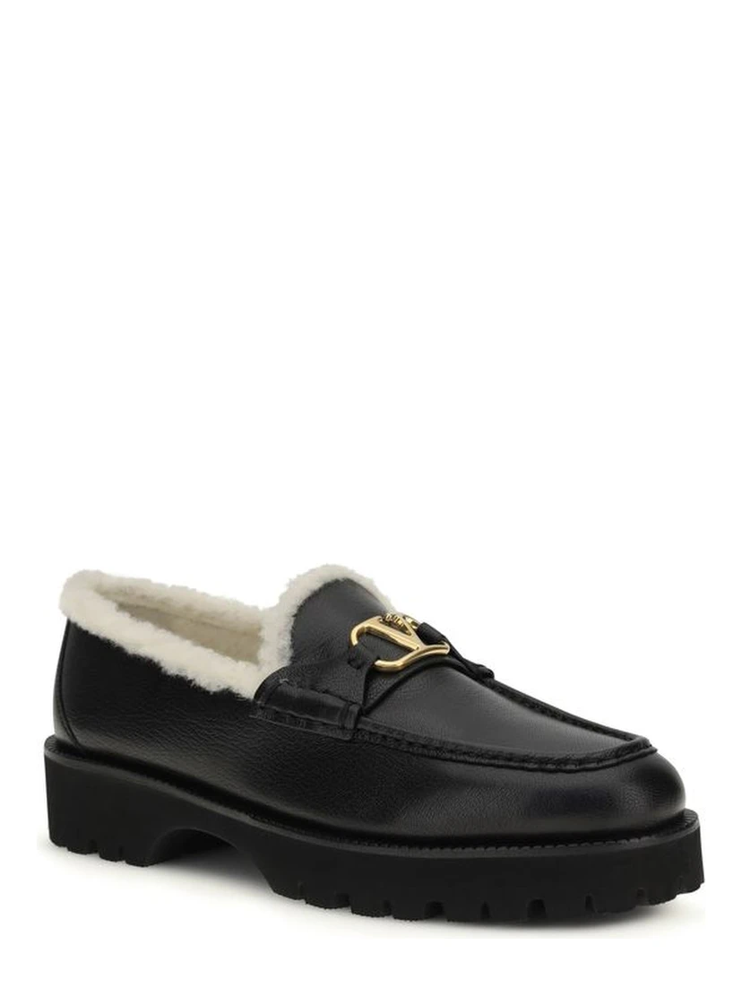 حذاء بوس توروس سهل الارتداء من جلد العجل الأسود