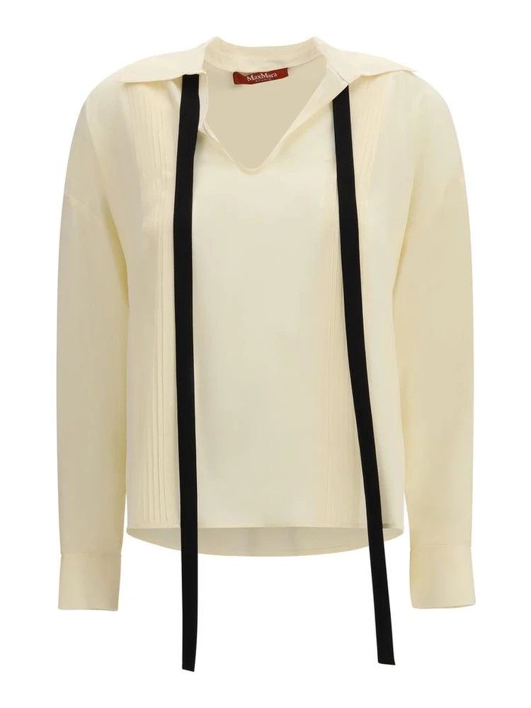 بلوزة حريرية بيج