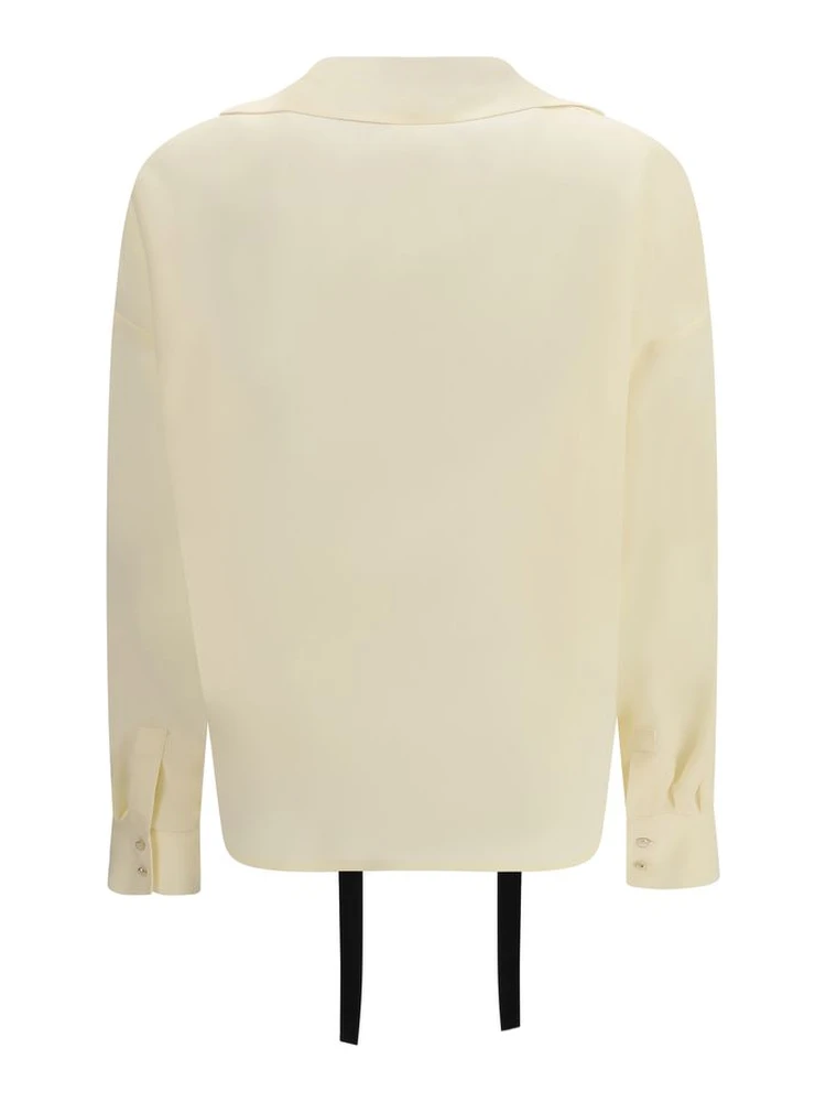 بلوزة حريرية بيج alternative