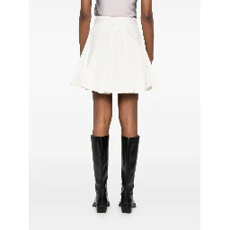 تنانير جينز من فيرساتشي كوتور باللون الكريمي