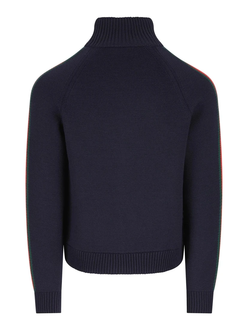 ملابس محبوكة بسحاب من الصوف