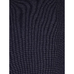 ملابس محبوكة بسحاب من الصوف