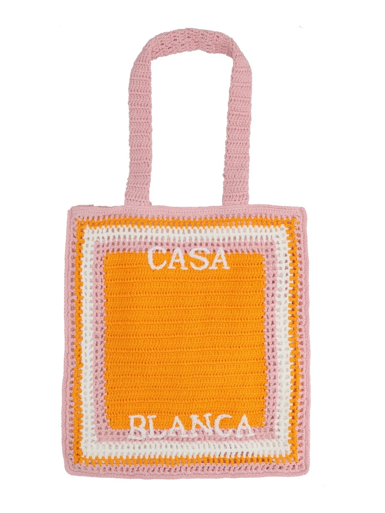 حقيبة تسوق مزينة بشعار