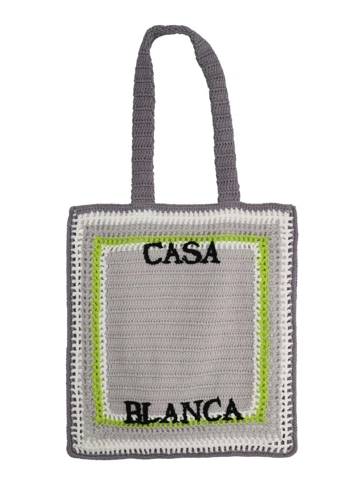 حقيبة تسوق مزينة بشعار