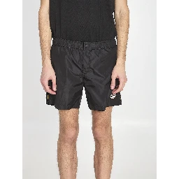 Swim shorts with a logo patch