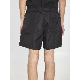 Swim shorts with a logo patch