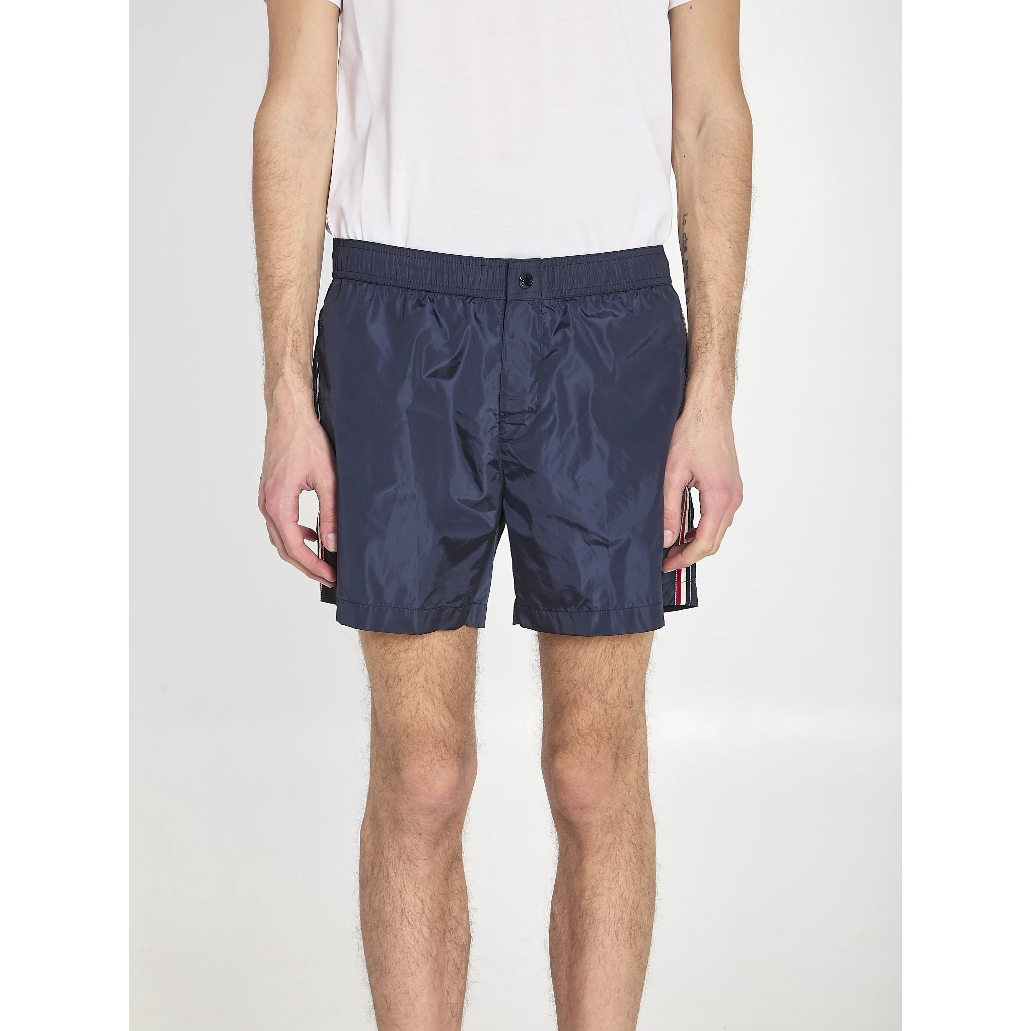 Swim shorts with a logo patch