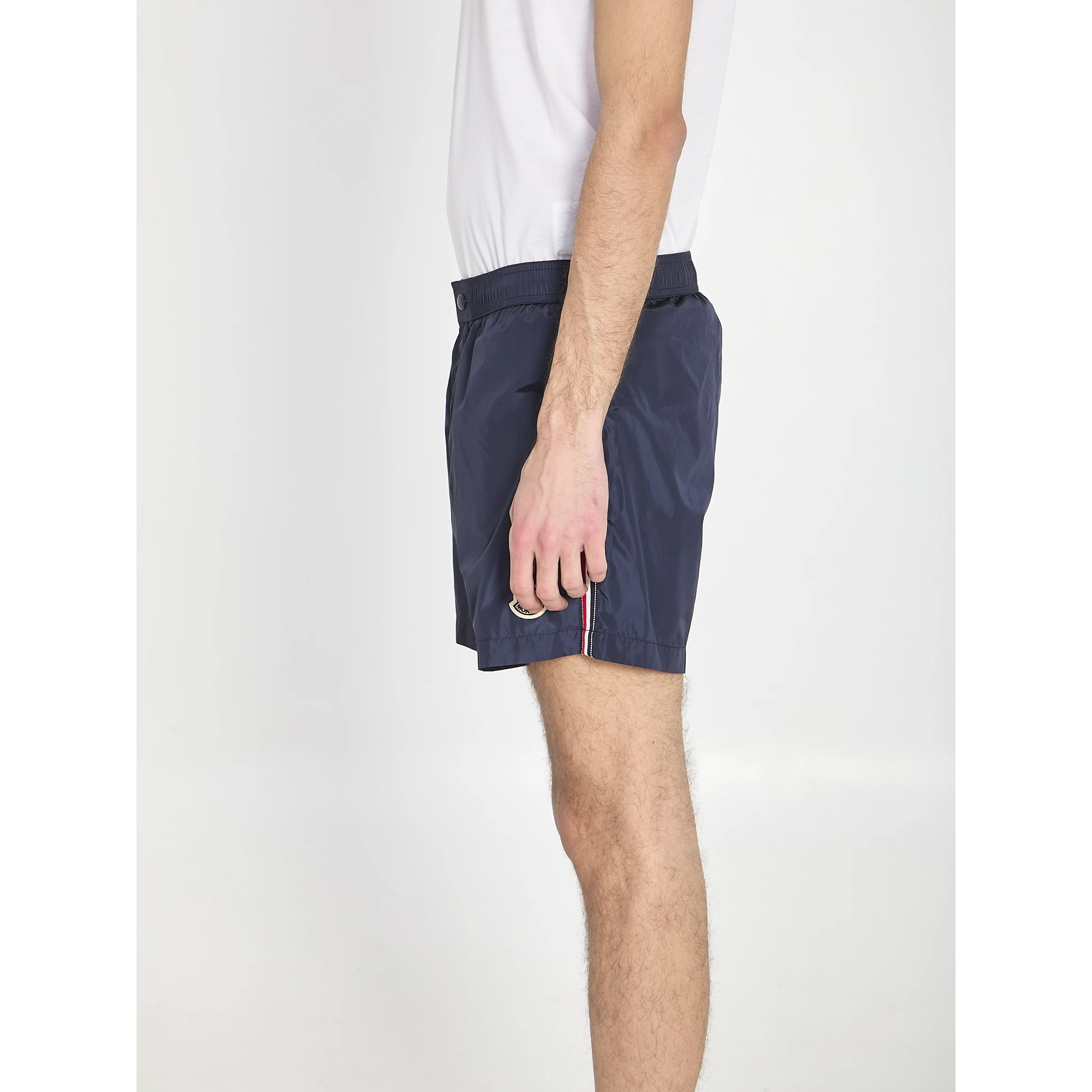 Swim shorts with a logo patch