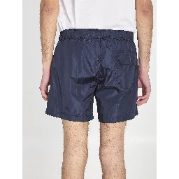 Swim shorts with a logo patch