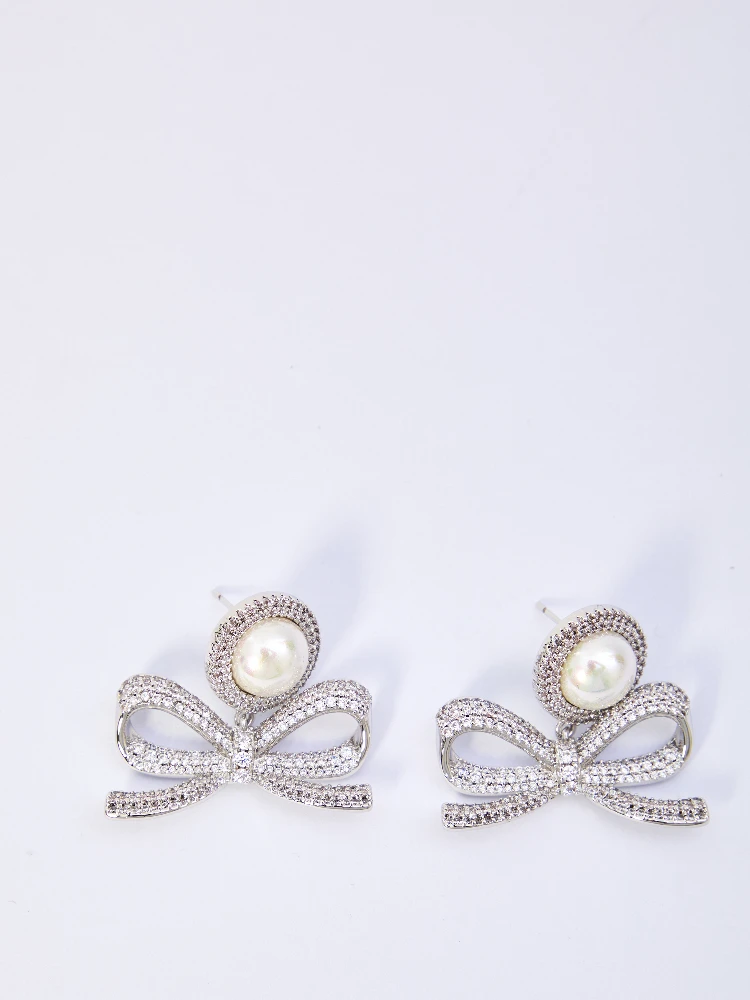 Pearl bow drop earrings