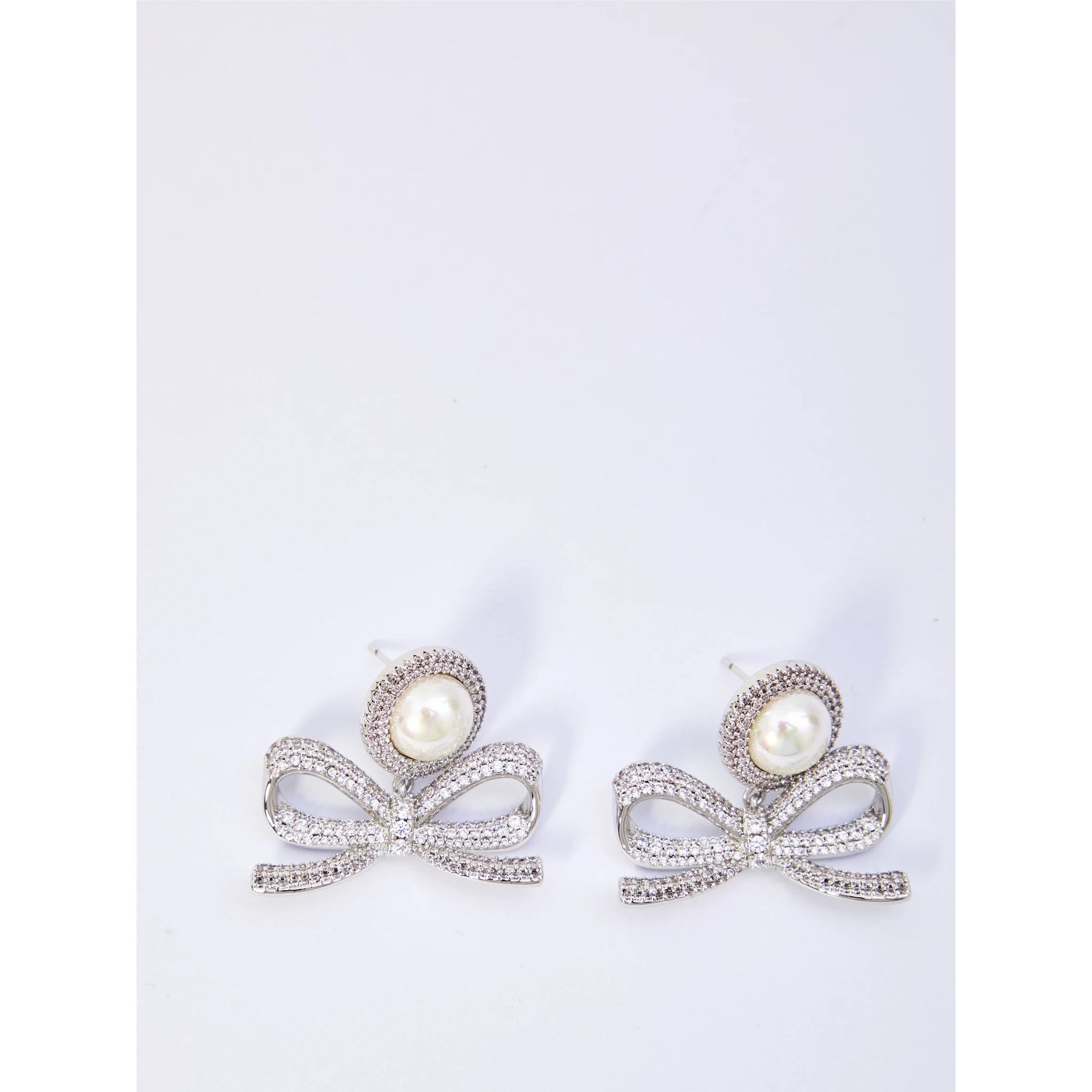 Pearl bow drop earrings