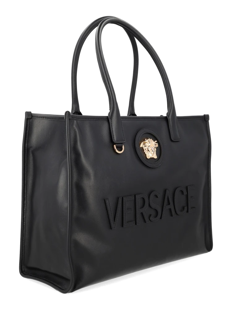 حقيبة تسوق مزينة بشعار alternative