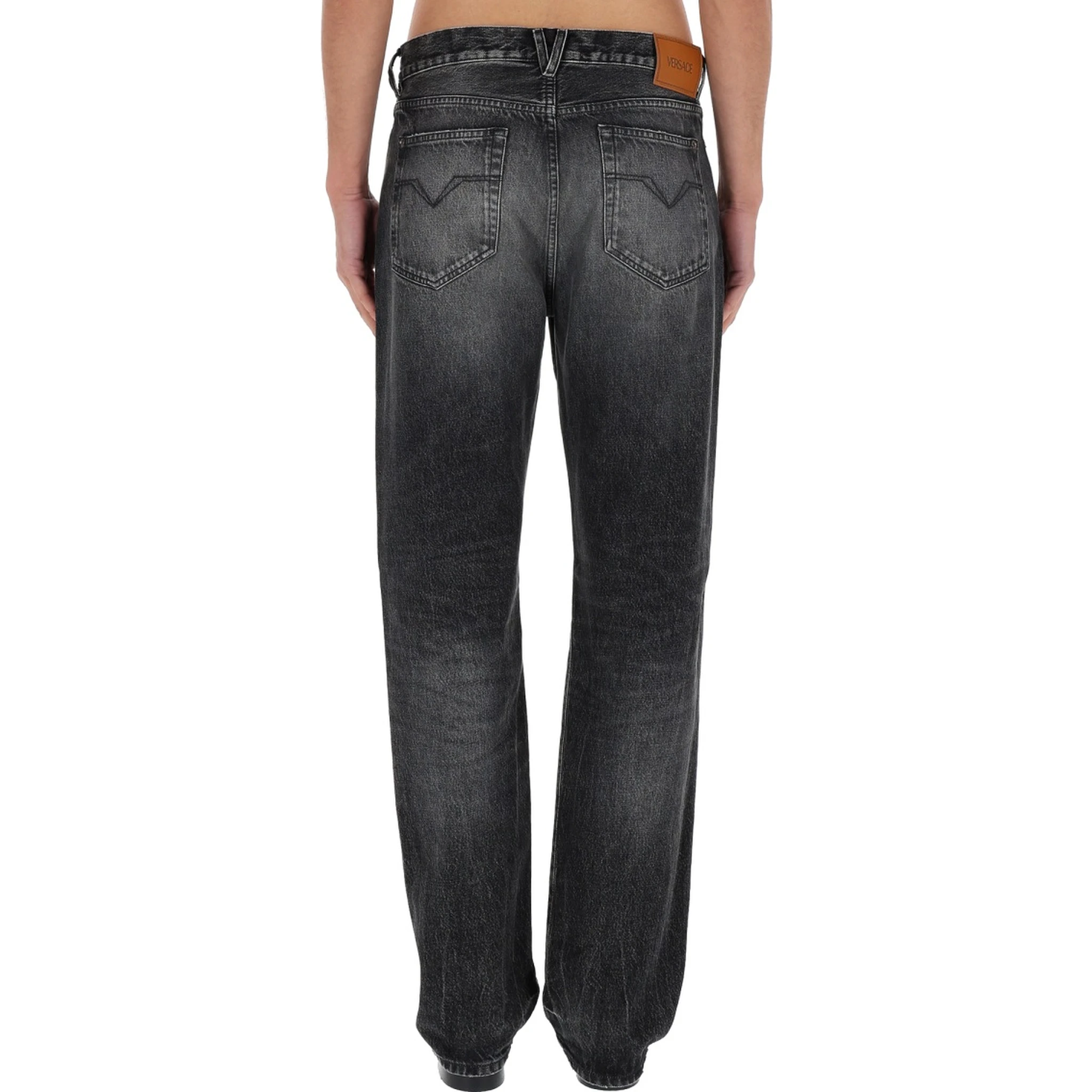 JEANS WITH "MEDUSA" DETAIL