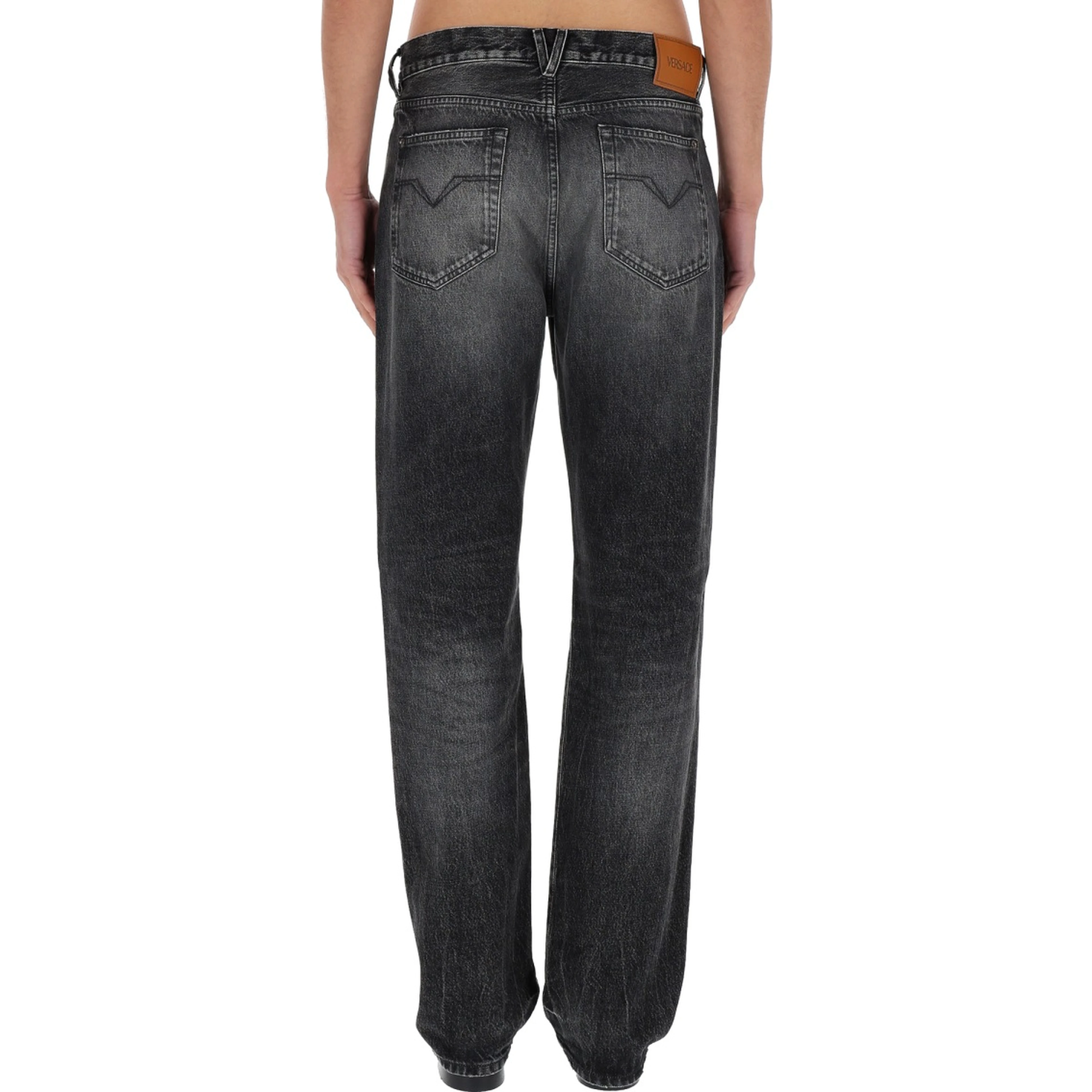 JEANS WITH "MEDUSA" DETAIL