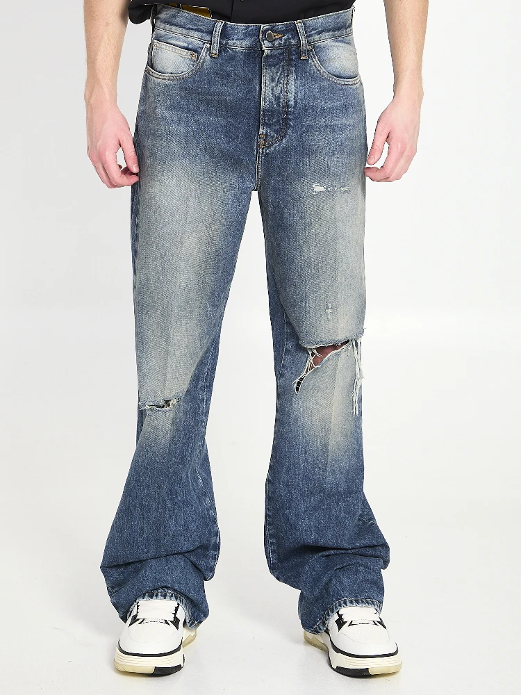 Slashed boot cut jeans
