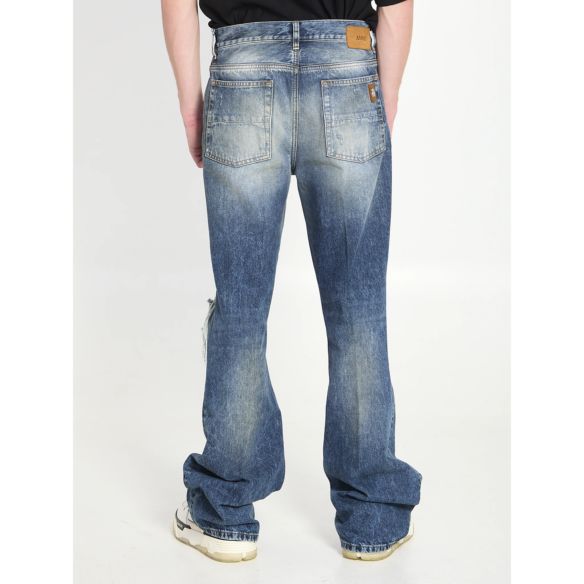 Slashed boot cut jeans