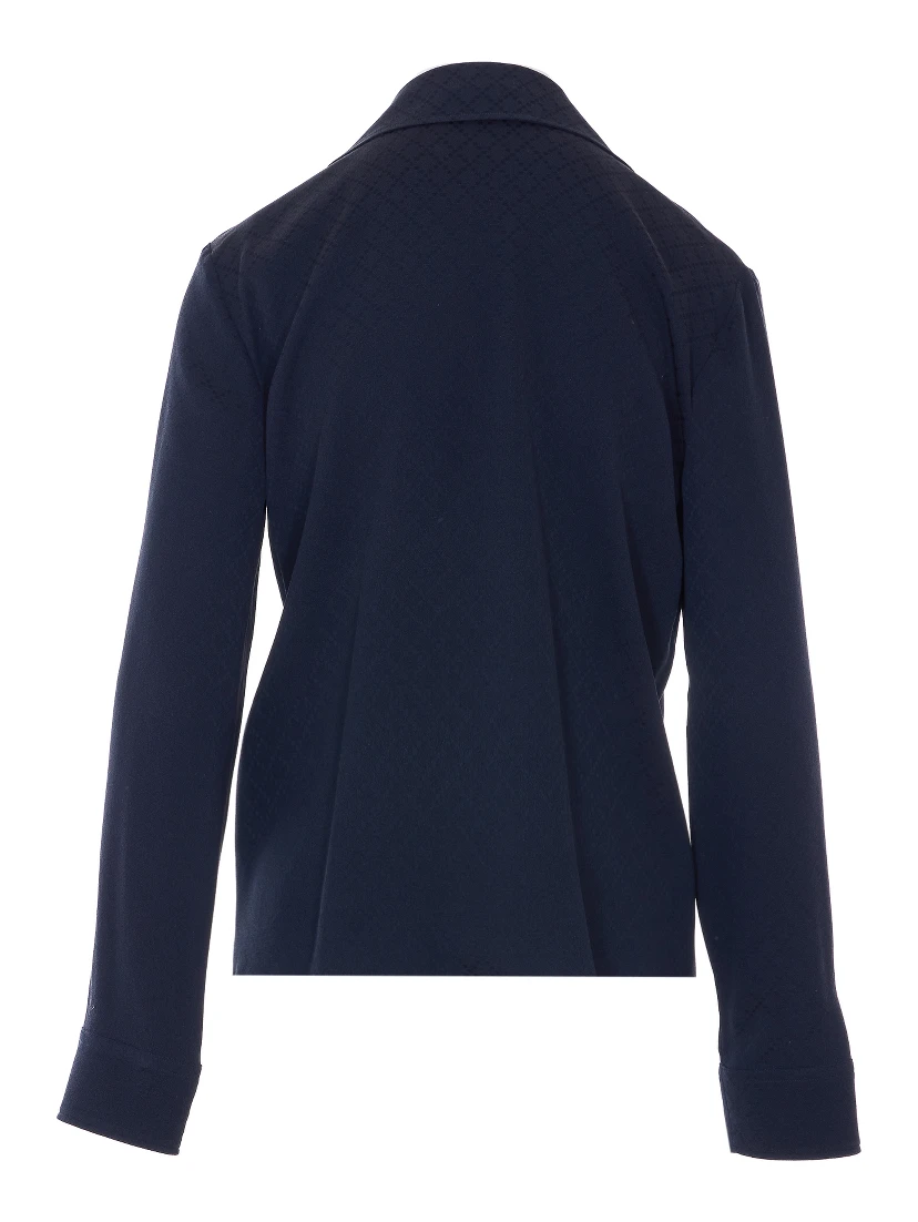 قمصان غوتشي زرقاء