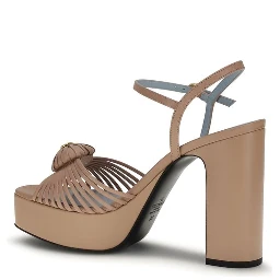 صندل بوس توروس ذو نعل سميك من جلد العجل البيج