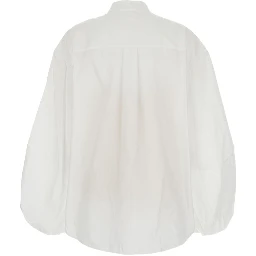 قمصان زيمرمان العاجية