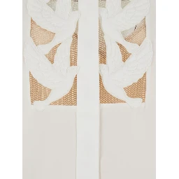 قمصان زيمرمان العاجية