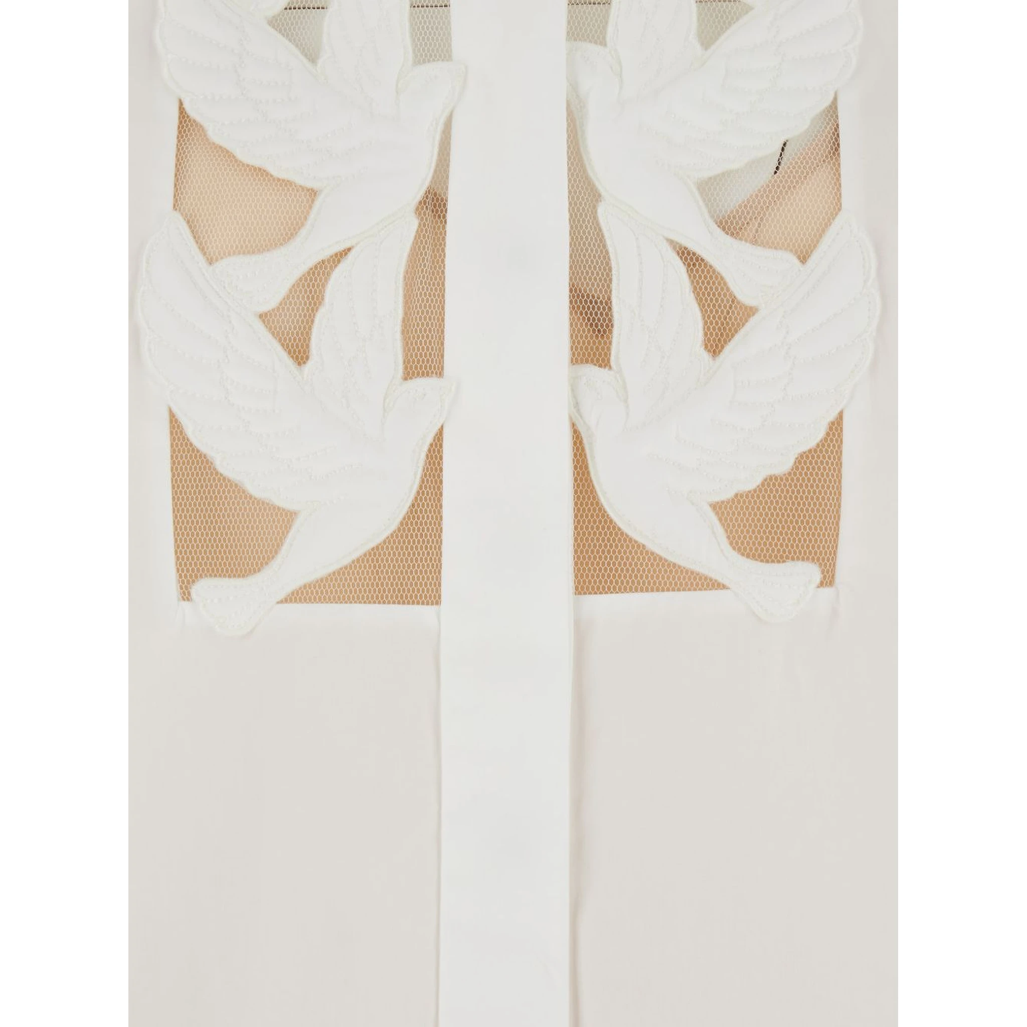 قمصان زيمرمان العاجية