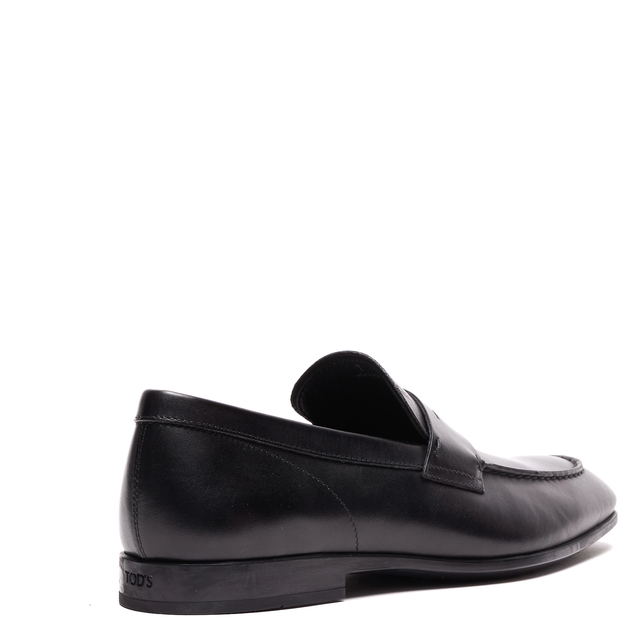 حذاء تودز مسطح أسود