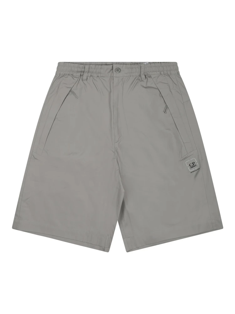 SHORTS "METROPOLIS" CON LOGO
