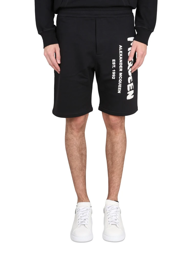 BERMUDA SHORTS WITH GRAFFITI LOGO PRINT