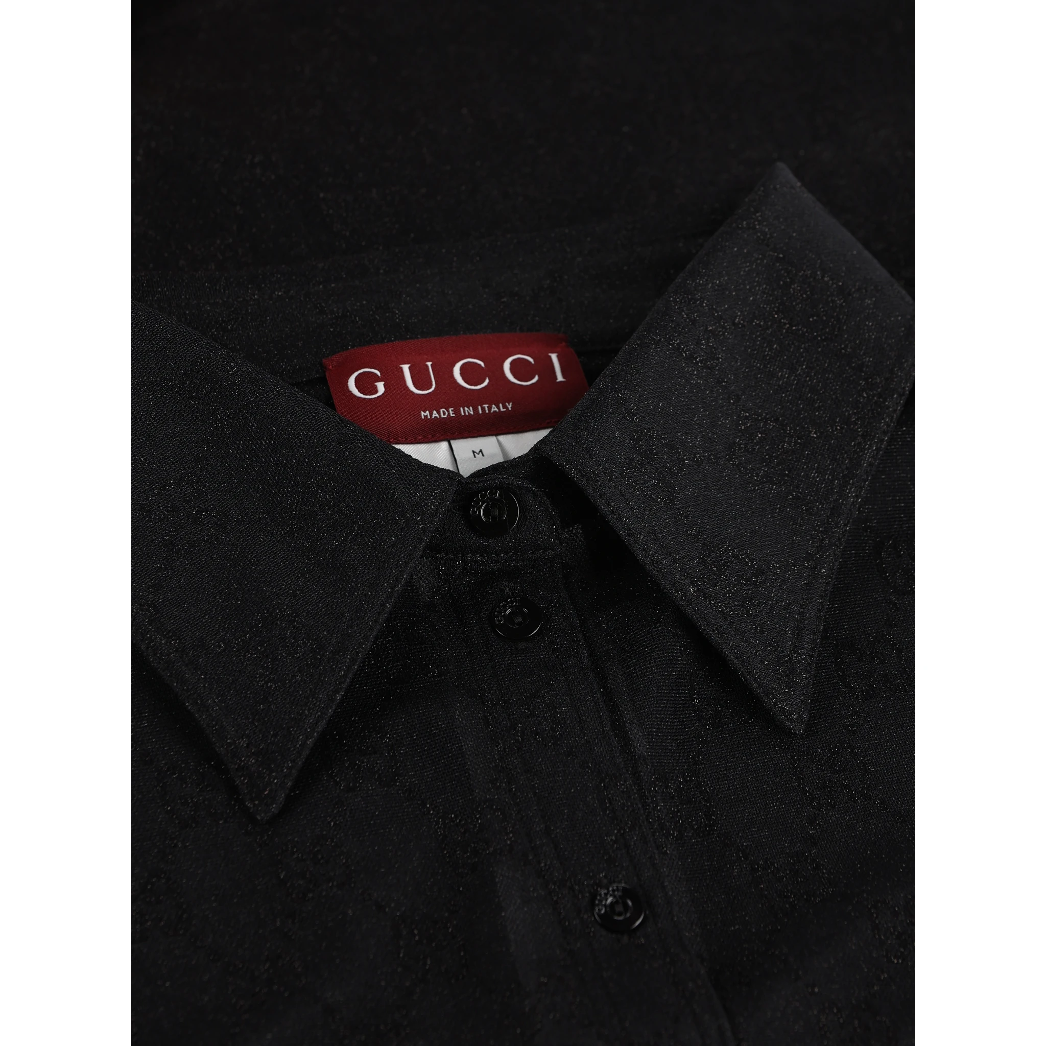 قمصان غوتشي سوداء