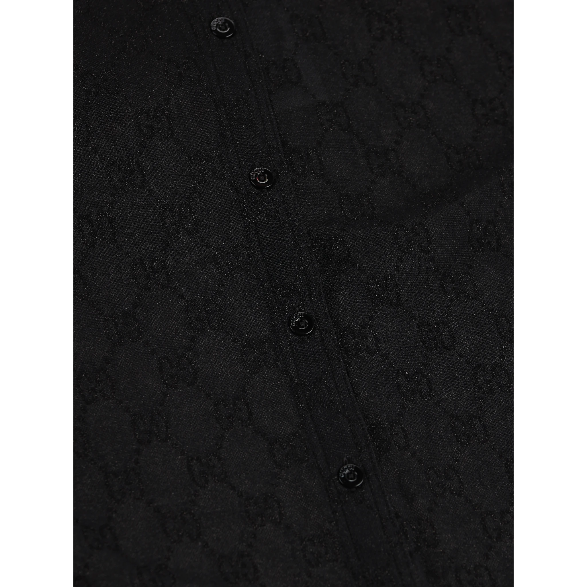 قمصان غوتشي سوداء