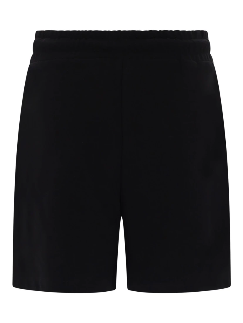 SHORTS CON LOGO