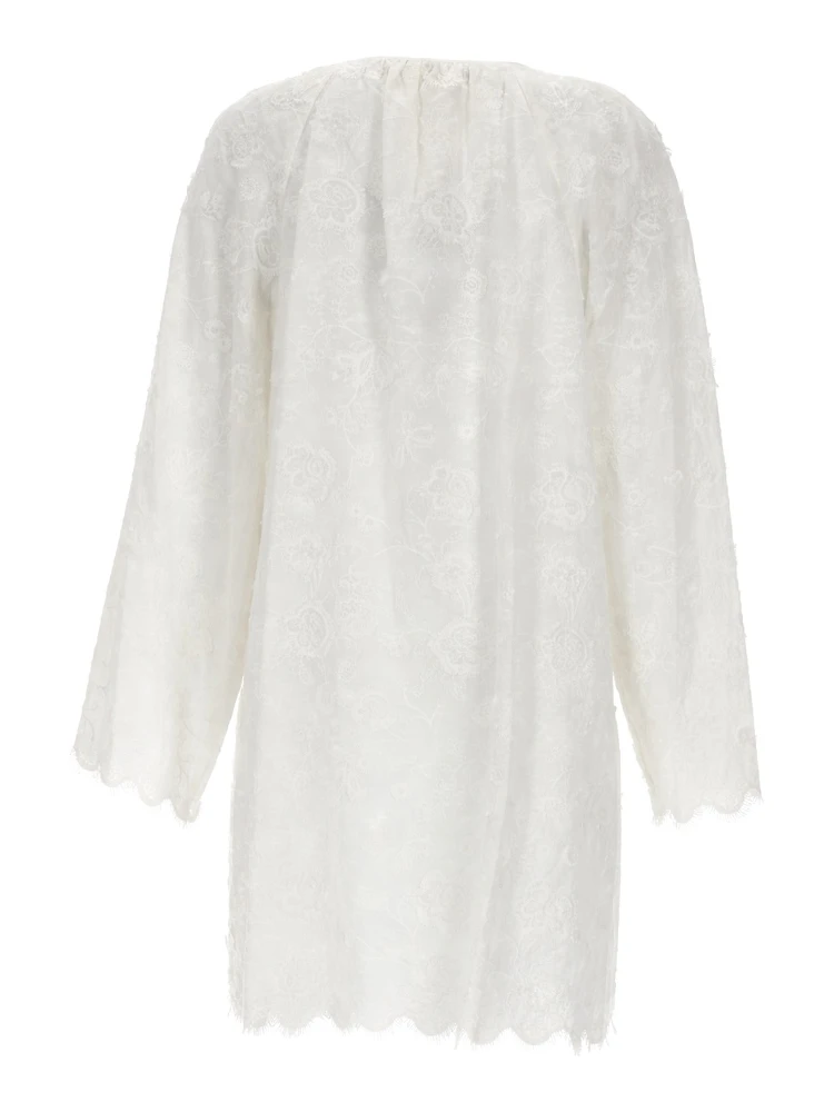 ABITO CON RICAMI FLOREALI alternative