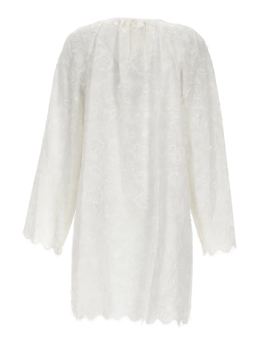 ABITO CON RICAMI FLOREALI