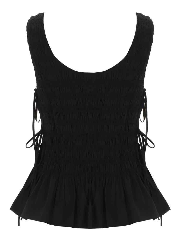 TOP "SMOCK" CON LACCI alternative