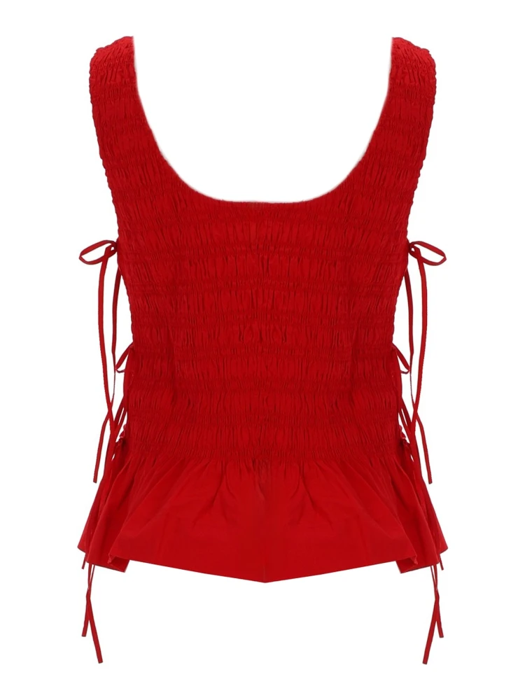 TOP "SMOCK" CON LACCI alternative