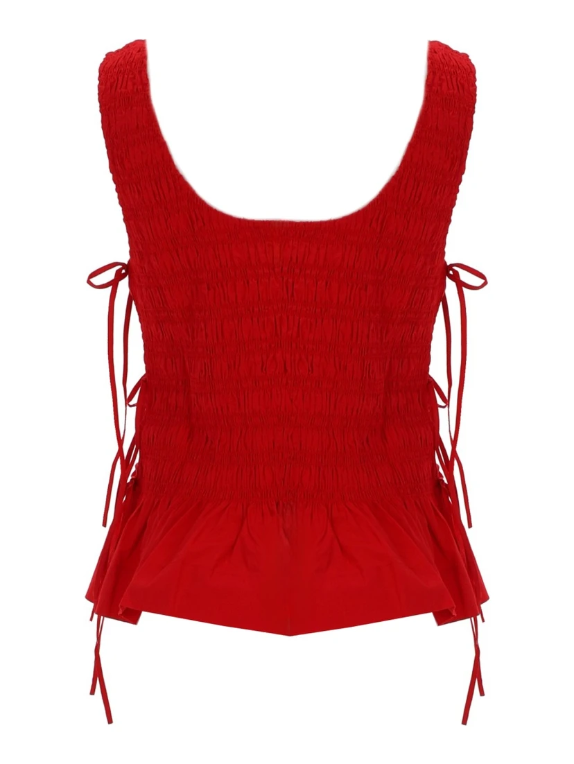 TOP "SMOCK" CON LACCI