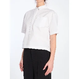 Shirt with embossed logo